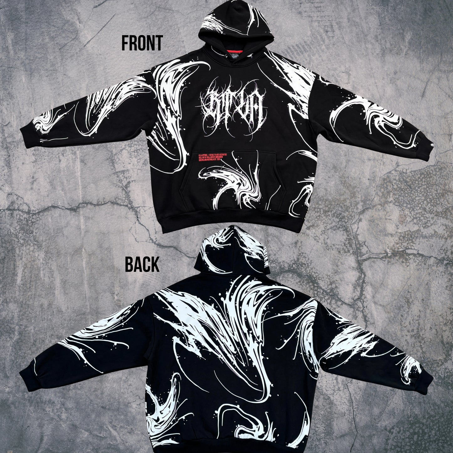 Black hoodie with white abstract designs on a textured gray background