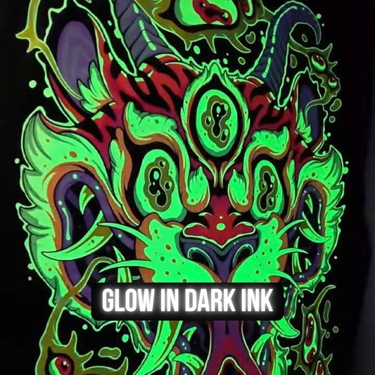 Glowing neon design with 'Glow in Dark Ink' text on a black background