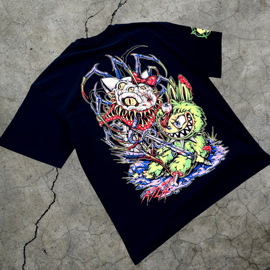 Black t-shirt with colorful graphic design on a textured surface