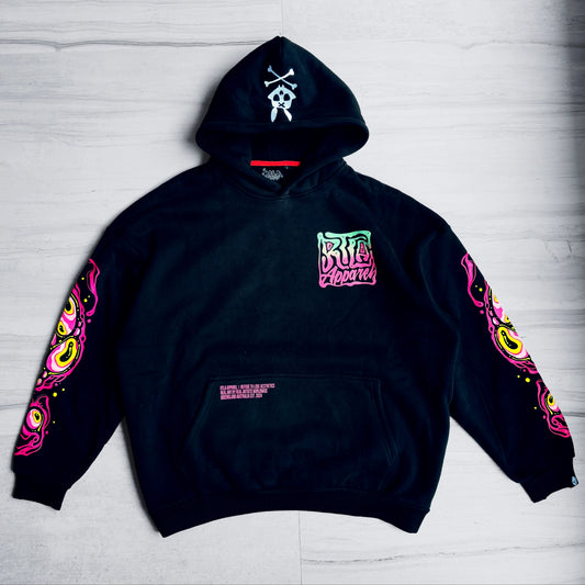 Black hoodie with colorful designs on a light gray background