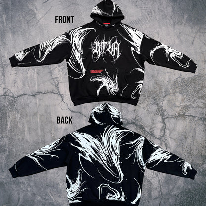 Black hoodie with white abstract designs on a textured gray background