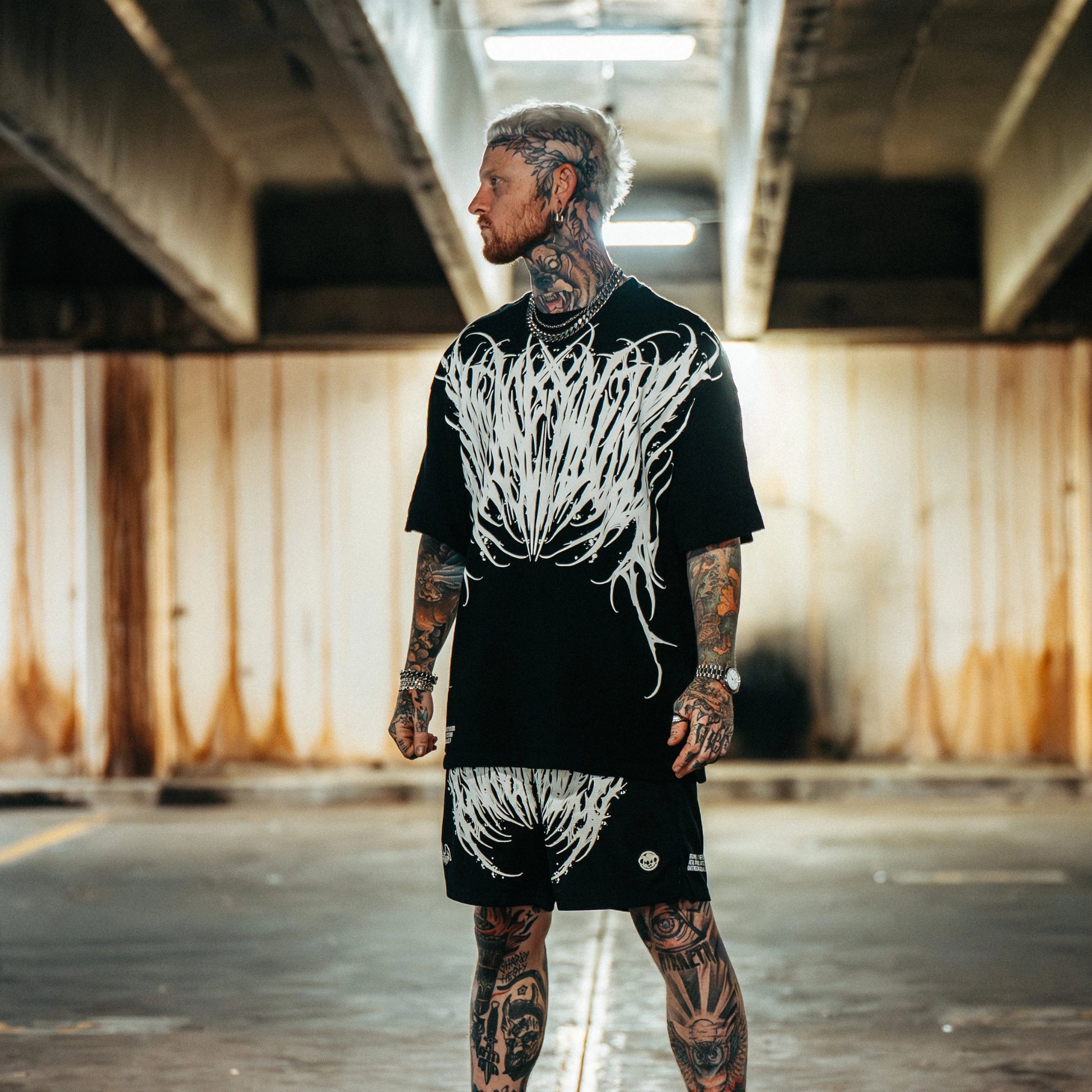 Red and black logo with 'WLK' on a black background