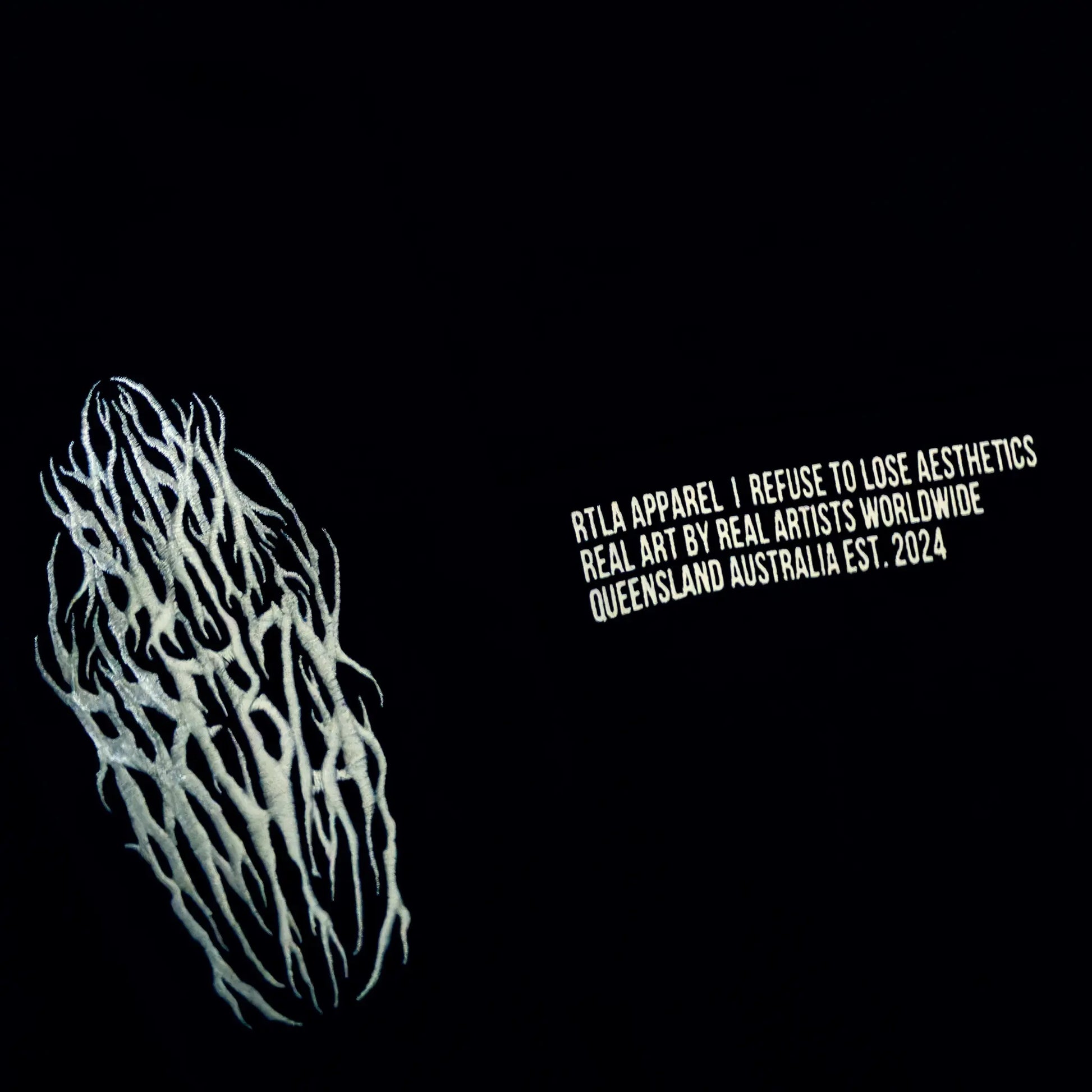 White abstract design on a black background with text about RTLA Apparel.