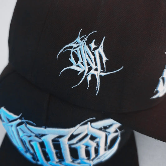 Black cap with white and blue logo on a white background