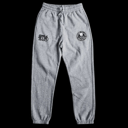 Gray sweatpants with logos on a black background