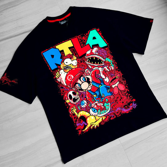 Black t-shirt with colorful graphic design on a light wooden floor