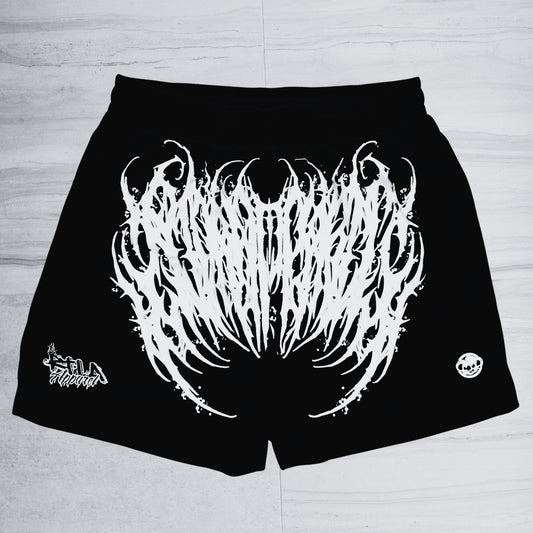 Black shorts with white graphic design on a light gray background