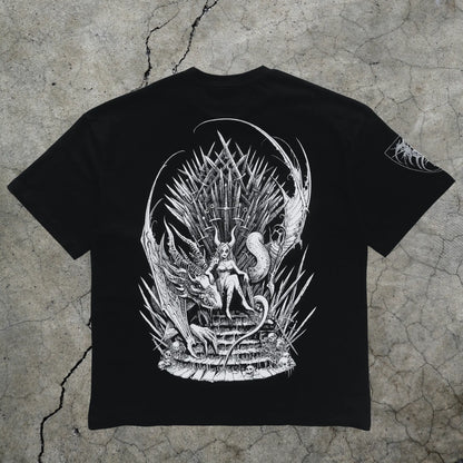 Black t-shirt with white graphic design on a textured gray background