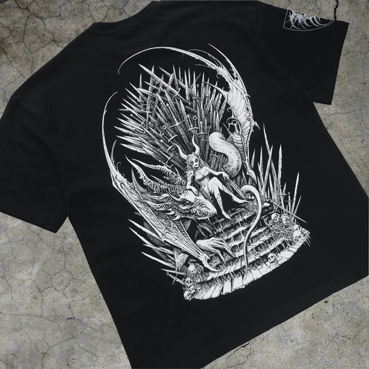 Black t-shirt with a white detailed design on a textured surface