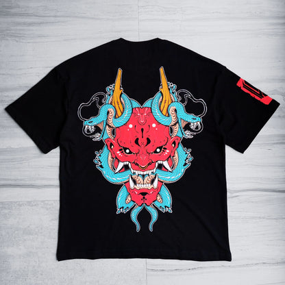 Black t-shirt with a red and blue dragon design on a wooden surface